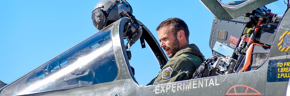 Pilot in cockpit of a fighter plane